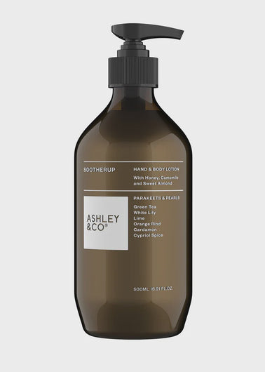 Brown bottle with pump labeled 'Ashley & Co' on a light gray background