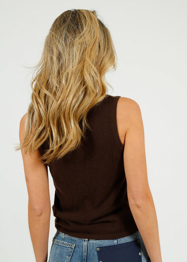 PARK Cashmere Tank Top in Hot Fudge Woman wearing a brown sleeveless top and blue jeans with sunglasses on a white background